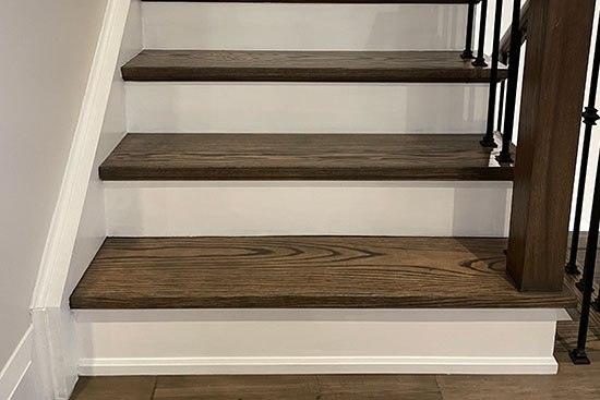Hardwood stairs refinishing in a home renovation